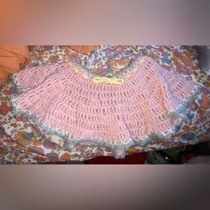 Handmade crochet tutuMade with a soft acrylic yarn with an alpaca hair boarder.